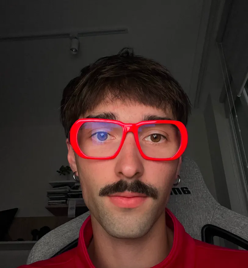 Ilya in red glasses